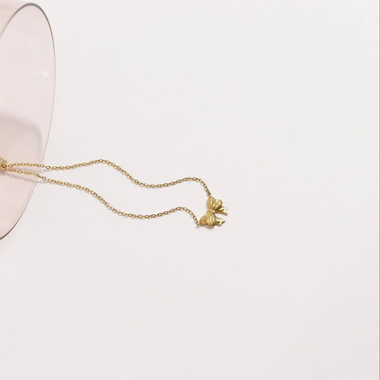 Author of My Tomorrow Gold Bow Necklace